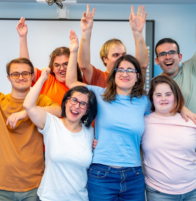 Happy members of the PBS community posing after gymnastic class. Portsmouth PBS Network.